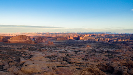 Fototapeta na wymiar Aerial view sunrise in Moab showing buttes and pinnacles