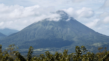 Fototapeta premium Arenal Volcano Blue Sky White Clouds