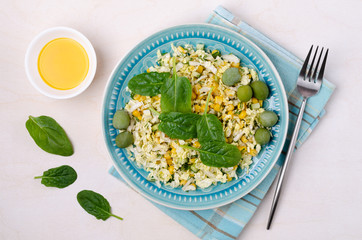 Vegetable salad with olives and spinach