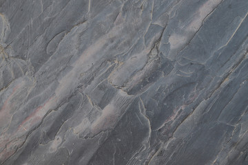 Closeup of stone, granite floor of walkway in the garden.