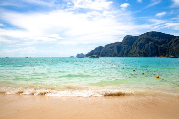 Ocean waves crashing at a tropical beach