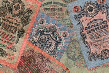 Original pattern, background from unique old Russian banknotes, rubles. Currency unit of Imperial Russia. Close-up, high resolution texture