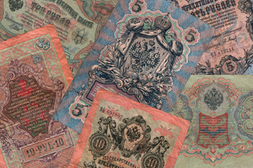 Original pattern, background from unique old Russian banknotes, rubles. Currency unit of Imperial...