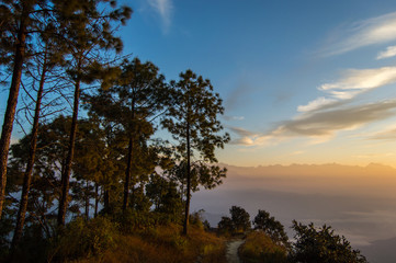 Fototapeta na wymiar Sunrise in the panoramic hiking trail in Nagarkot, Nepal