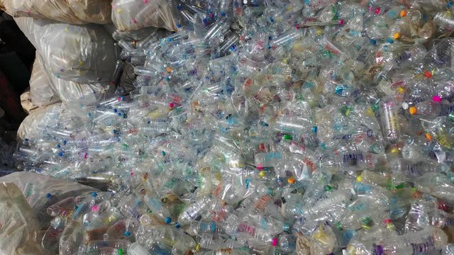 Plastic bottles collected for recycling at factory in Thailand 