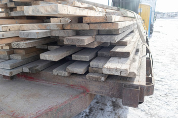 Pile of Wood on trailer bed to be used for contruction site