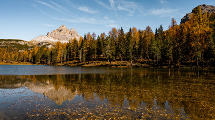 Nice view around Lago Antorno or lake Antorno before noon . One of the most beautiful scenic lake in Dolomites  during Autumn season , Dolomites , South Tyrol , Italy