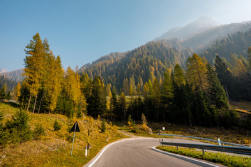 Nice view on the road from nature landscape in Dolomites . The mountain range in northern part of Italian Alps during autumn , Dolomites ,  South Tyrol and Trentino in Italy