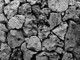 Abstract scratch grunge concrete wall texture. Use as a baclground or wallpaper. Space for text. Black and white, so contrast and grainy