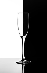 a glass of champagne or wine in the style of Domino