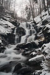 winter mountains waterfall. water motion blurred