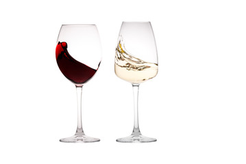 Glass of white wine and a glass of red wine on a white background.