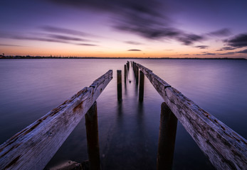 Fototapeta premium wooden pier at sunset