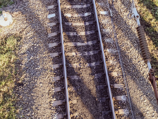 Plot railway. Top view on the rails. High-voltage power lines for electric trains