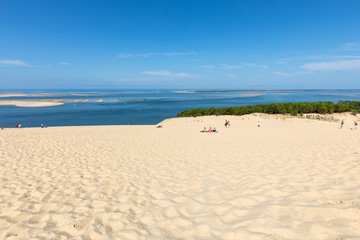 People on the Dune of Pilat, the tallest sand dune in Europe. La Teste-de-Buch, Arcachon Bay, Aquitaine, France