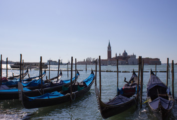 Empty gondolas are waiting for tourists