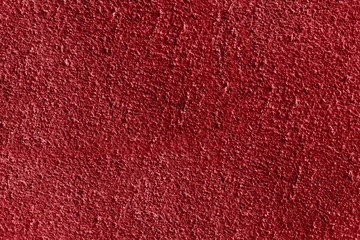 Macro texture of red suede.