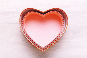 valentines day concept. heart shaped gift boxes on a light wooden table