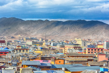 lots of old roof with blue sky in old town of Shangrila, Zhongdian, china