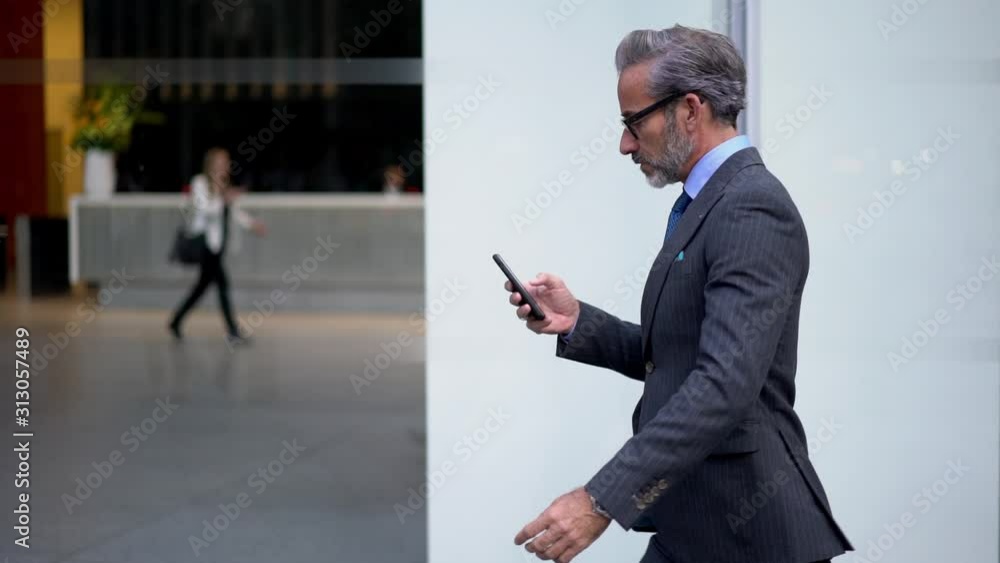 Aufkleber slow motion effect, caucasian businessman dressed in formal suit browsing network website using mode
