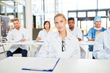 Doctors in a seminar for further education