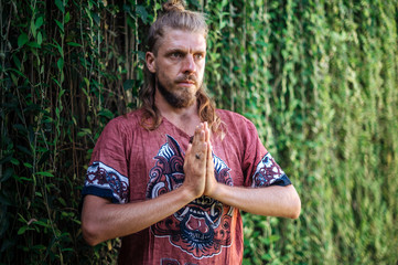 Man practice Yoga practice and meditation outdoor
