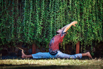 Man practice Yoga practice and meditation outdoor