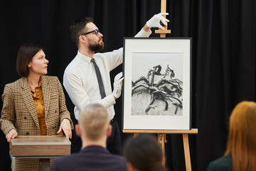 Businessman is going to present new modern art to the audience during business conference