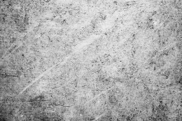 Fototapeta na wymiar Metal texture with scratches and cracks which can be used as a background
