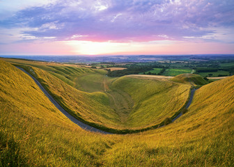 Obraz premium The Manger Uffington, Oxfordshire, England, UK. An ice formed steep sided valley, viewed from White Horse Hill.