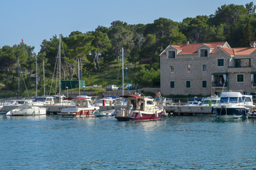 Fototapeta na wymiar Fisherman's boats in wharf in Makarska, Croatia on June 9, 2019.