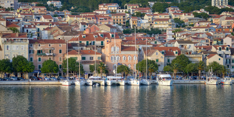 Fototapeta na wymiar View of Makarska city center from the sea in Makarska, Dalmatia, Croatia on June 11, 2019. 