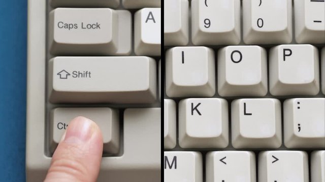 Male finger pushes CTRL + O button on white keyboard. Slow motion and macro view
