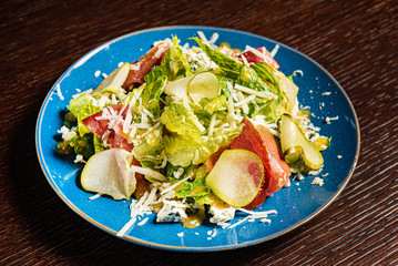 tasty salad with parma and cheese