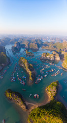 Aerial sunset view of Lan Ha bay and Cat Ba island, Vietnam, unique limestone rock islands and...