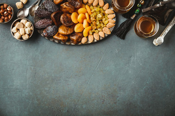 Traditional arabic tea and dry fruits and nuts, flat lay