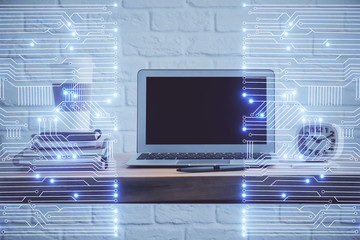 Computer on desktop in office with technology theme hologram. Multi exposure. Tech concept.