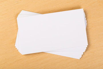 Photo of blank business cards on a general background. Template for identifier. View from above. mock up