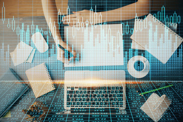 Financial graph displayed on woman's hand taking notes background. Concept of research. Multi exposure