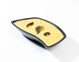 Indian Traditional Cuisine Kadhi Also Know as Curry, Yogurt Curry on White Background