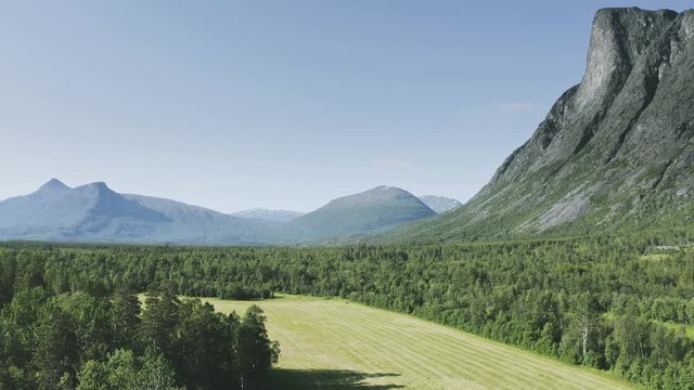 Mountains and valley field and forest aerial view landscape in northern Norway Travel destinations Reisa national park nature scenery ecology environment concept
