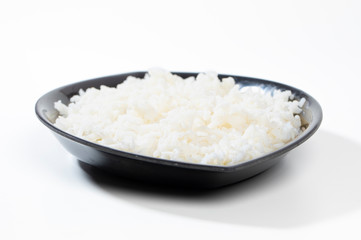 bowl of boiled rice on white background