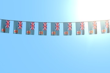cute many Fiji flags or banners hangs on rope on blue sky background - any holiday flag 3d illustration..