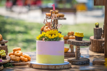 Birthday cake with table setting decorations 