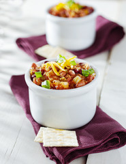 bowl of chili beef chili shot with selective focus.