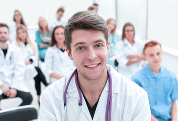 Fototapeta premium top view. a group of smiling doctors pointing at you.