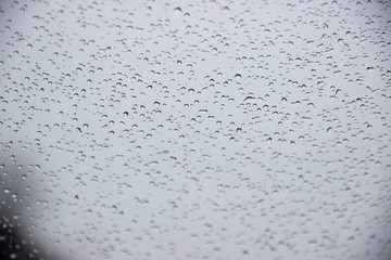 Drops on glass after rain in cloudy weather.