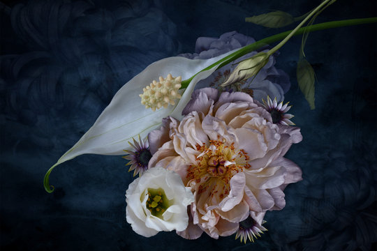Flower arrangement, white on dark background