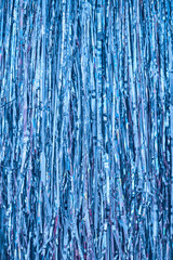 Close up of shiny blue tinsel background