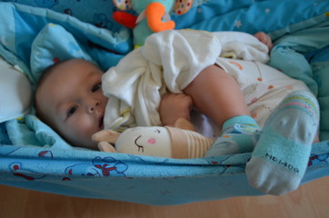 Cute newborn six month old baby boy